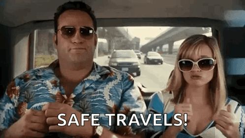Man and Woman in Car Safe Travels