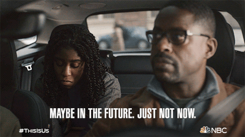 Man and Woman in Car Saying Maybe in the Future Just Not Now