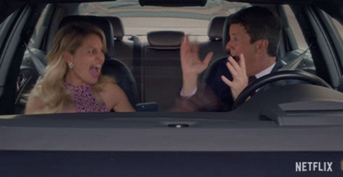 Man and Woman in Car with Netflix Logo