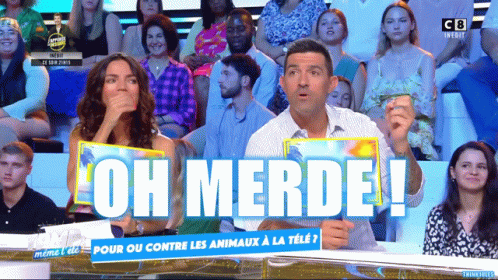 Man and Woman in Crowd Saying Oh Merde