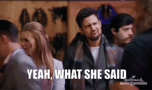 Man and Woman in Crowd Saying Yeah What She Said