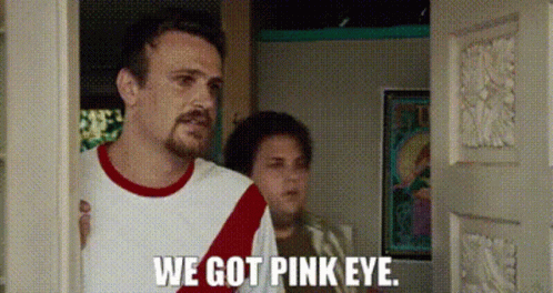 Man And Woman In Doorway Saying We Got Pink Eye GIF