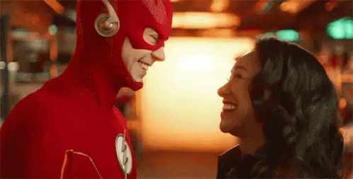 Man and Woman in Flash Costumes