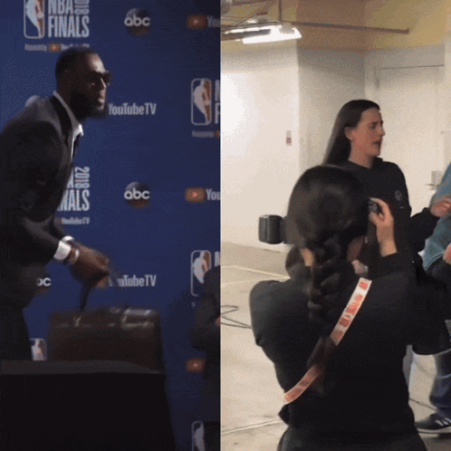 Man and Woman in Front of Blue Wall Saying NBA Finals