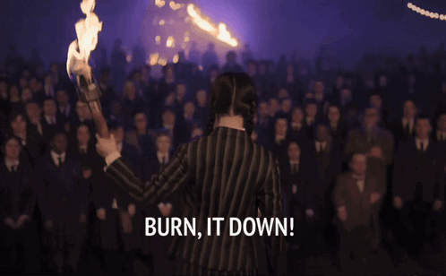 Man and Woman in Front of Fire Burn It Down