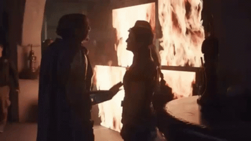 Man and Woman in Front of Flame Screen