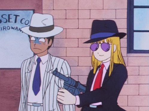 Man and Woman in Front of Set Co Sign