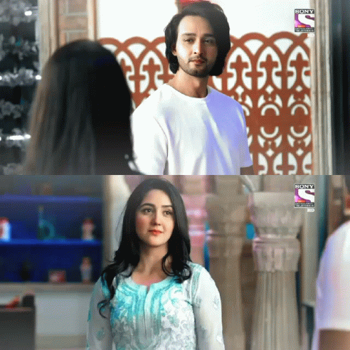 Man And Woman In Front Of Sony Entertainment HD Screen GIF