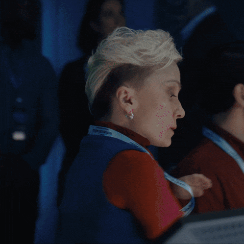 Man And Woman In Front Of Transmit Live Screen GIF