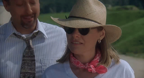 Man And Woman In Hats And Sunglasses GIF