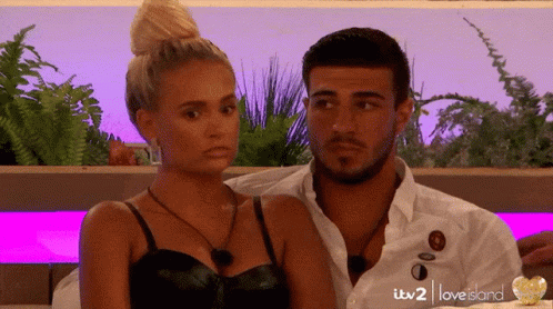 Man and Woman in Love Island Scene