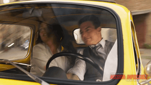 Man and Woman in Mission Impossible Car