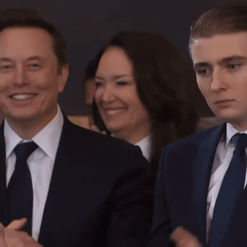 Man and Woman in Suits and Ties