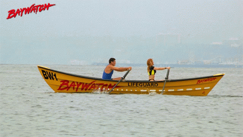 Man And Woman In Yellow Baywatch Lifeguard Boat GIF