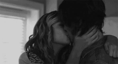 Man And Woman Kissing GIF