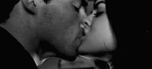 Man And Woman Kissing GIF