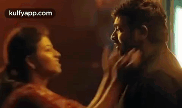 Man And Woman Kissing GIF