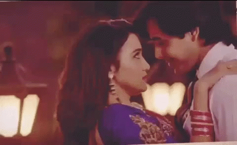 Man And Woman Kissing And Hugging GIF