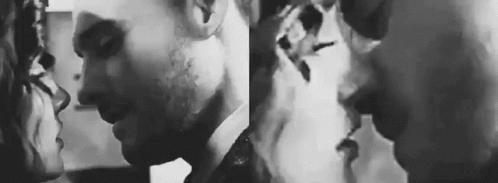 Man And Woman Kissing And Smoking GIF