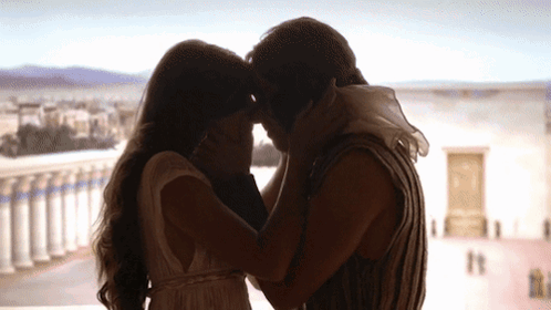 Man and Woman Kissing at Window