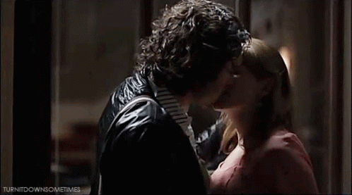 Man And Woman Kissing GIF