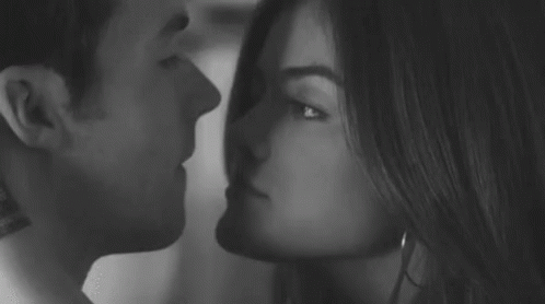 Man And Woman Kissing GIF
