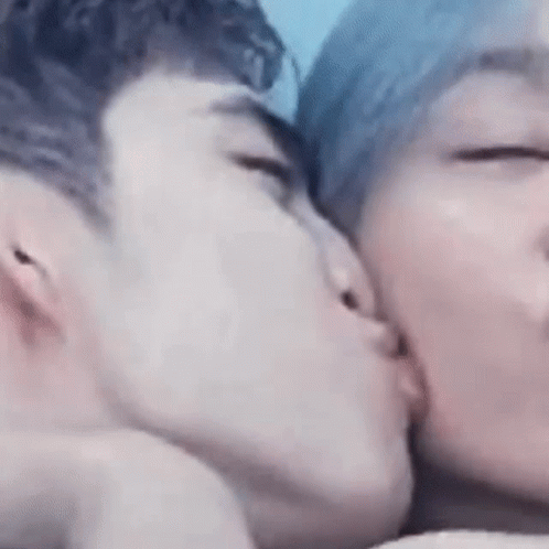 Man And Woman Kissing Cheek GIF