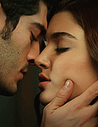 Man And Woman Kissing Close Up GIF