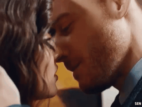 Man And Woman Kissing Close Up GIF