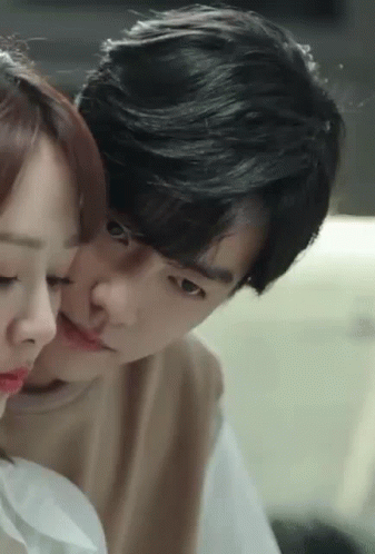 Man And Woman Kissing Close Up GIF