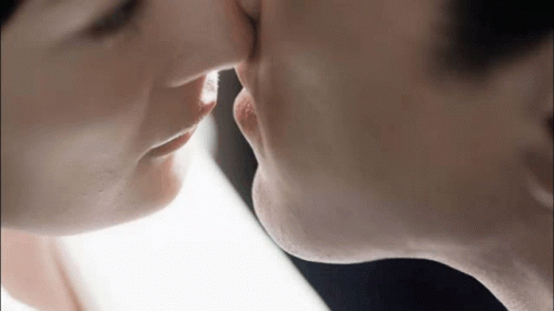 Man And Woman Kissing Close Up GIF