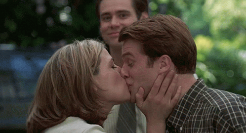 Man And Woman Kissing GIF