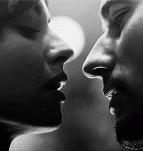 Man And Woman Kissing GIF