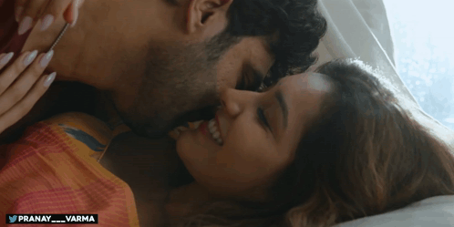 Man and Woman Kissing in Bed Pranay Varma