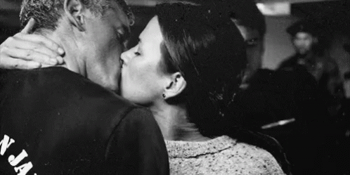 Man And Woman Kissing In Black And White GIF