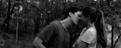 Man And Woman Kissing In Black And White GIF