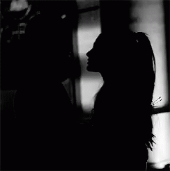 Man and Woman Kissing in Black and White