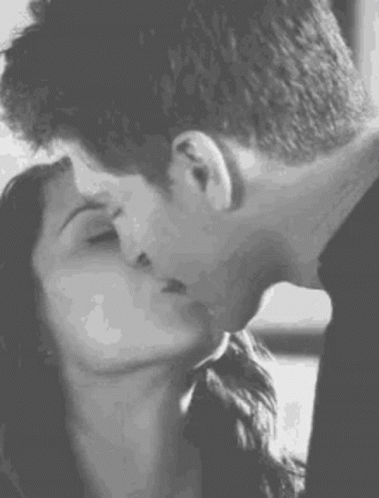 Man And Woman Kissing In Black And White GIF