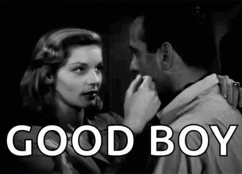 Man and Woman Kissing in Black and White Photo Saying Good Boy