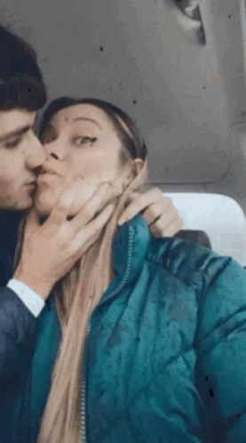 Man And Woman Kissing In Car GIF