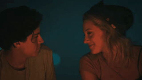 Man And Woman Kissing In Dark Room GIF