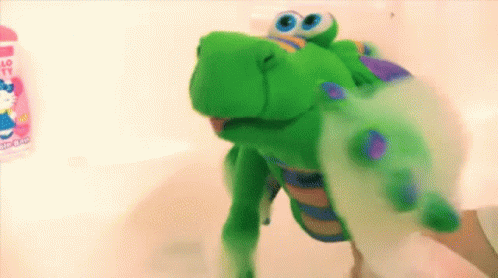 Man And Woman Kissing In Front Of Bazaar Banner GIF