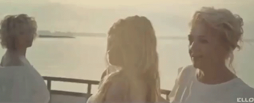 Man And Woman Kissing In Front Of Range Rover GIF