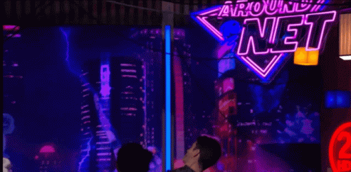 Man and Woman Kissing in Front of US Army Sign
