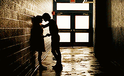 Man And Woman Kissing In Hallway GIF