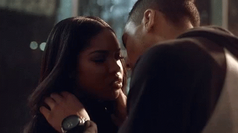 Man And Woman Kissing In Room GIF