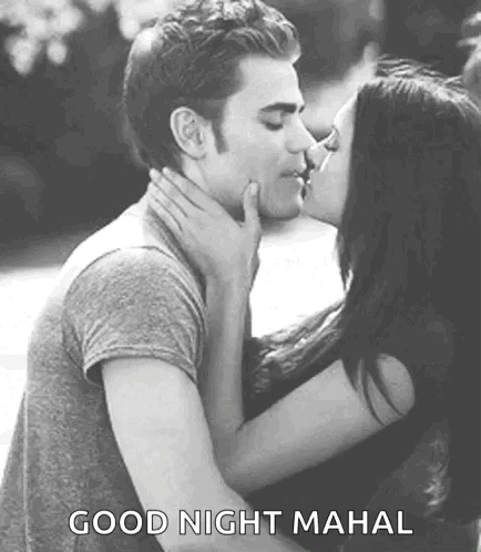 Man And Woman Kissing GIF