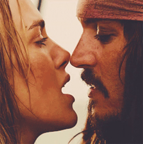 Man and Woman Kissing Open Mouth