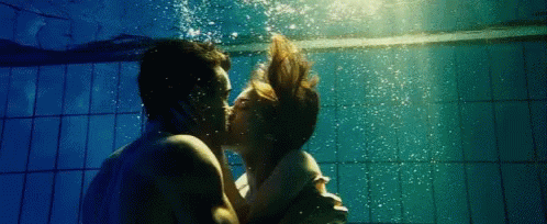 Man and Woman Kissing Underwater