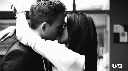 Man And Woman Kissing USA Corner GIF